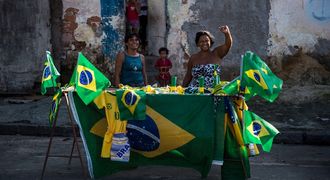 A street vendor sells Brazilian paraphernalia for the Soccer World Cup in Rio de Janeiro. Picture: AFP PHOTO/ YASUYOSHI CHIBA
