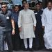 India's Prime Minister Narendra Modi, centre, walks to speak with the media as he arrives to attend his first Parliament session in New Delhi, India, last week. Picture: REUTERS