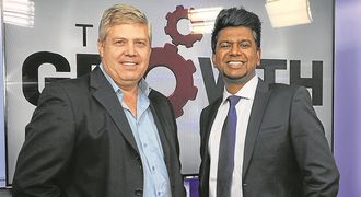 Winstone Jordaan (left) MD and owner of GridCars, and Deena Govender, head of customer relations at BMW — a success story of how small and big business can work together to add value, says Govender. Picture: FREDDY MAVUNDA