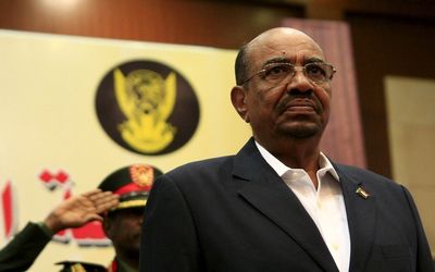 Sudanese President Omar al-Bashir listens to the national anthem during opening session of Sudan National Dialogue conference this week. Picture: REUTERS/MOHAMED NURELDIN ABDALLAH