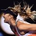 Maria Sharapova of Russia serves against Belinda Bencic of Switzerland during their fourth round match at the Australian Open tennis tournament in Melbourne, Australia, on Sunday. Picture: EPA/TRACEY NEARMY