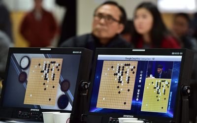 South Korean 'Go' game fans watch a television screen broadcasting live footage of the Google DeepMind Challenge Match, at the Korea Baduk Association in Seoul on March 9, 2016. Picture:AFP/JUNG YEON-JE