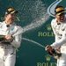 CELEBRATION:  Lewis Hamilton, right, and Mercedes teammate Nico Rosberg spray each other after Hamilton won last year’s Australian Grand Prix. Picture: AFP
