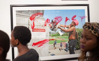 UCT’s Trans Collective used their naked bodies and defaced photographs at an exhibition  after they had taken issue with the#RhodesMustFall movement. Picture: GROUNDUP/ ASHRAF HENDRICKS